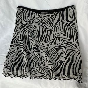 Mini skirt tiger print. Urban Outfitters. Size small